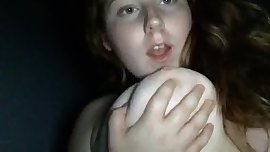 busty teen sucks on her DDD tits