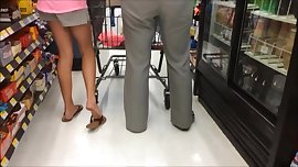 Legs and Feet Standing In Line