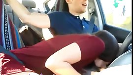 Sucking her boyfriend on car
