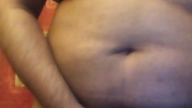 Chubby guy with boobs playing with dick