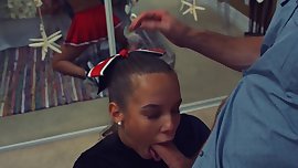 Cute cheerleader with braces gags on cock