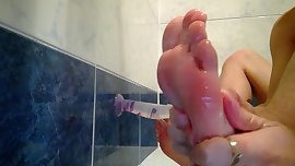 Cuntboy does a slimy footjob in the shower