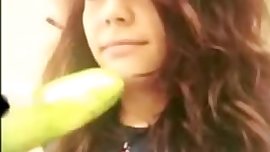 Teen fucks cucumber in store